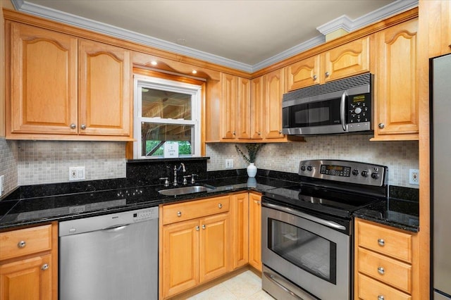 303 Helena Ave, Yonkers, NY 10710 - kitchen featuring appliances with stainless steel finishes, dark stone counters, ornamental molding, and decorative backsplash