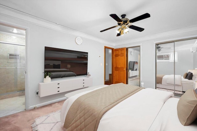 303 Helena Ave, Yonkers, NY 10710 - bedroom featuring multiple closets, ornamental molding, carpet, ensuite bath, and ceiling fan