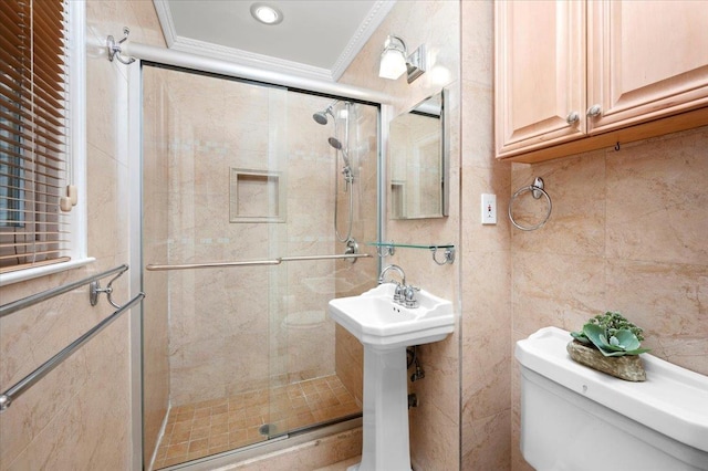 303 Helena Ave, Yonkers, NY 10710 - full bathroom featuring crown molding, tile walls, and a stall shower