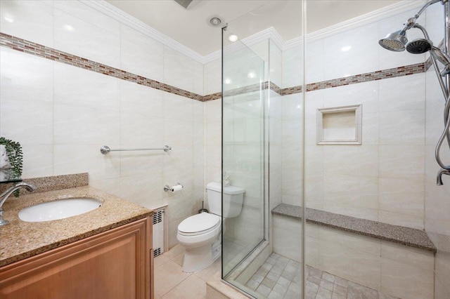 303 Helena Ave, Yonkers, NY 10710 - bathroom with a shower stall, tile walls, vanity, crown molding, and tile patterned floors