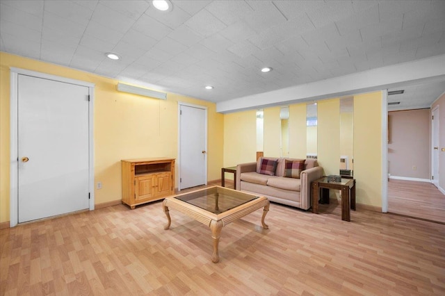 303 Helena Ave, Yonkers, NY 10710 - living room with light wood finished floors and recessed lighting