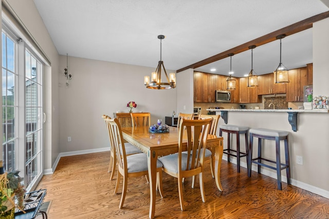 48 Sparrow Ridge Rd, Carmel, NY 10512 - dining room featuring light wood-style flooring, a chandelier, and recessed lighting