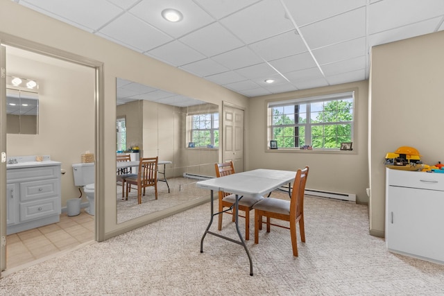 48 Sparrow Ridge Rd, Carmel, NY 10512 - dining space featuring a baseboard radiator, light carpet, and a paneled ceiling