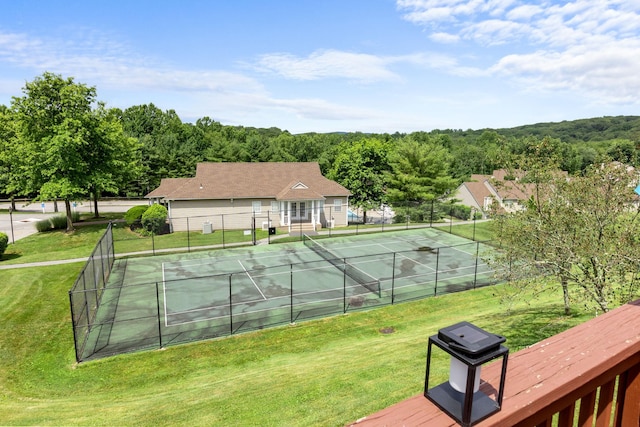 48 Sparrow Ridge Rd, Carmel, NY 10512 - view of tennis court with a wooded view