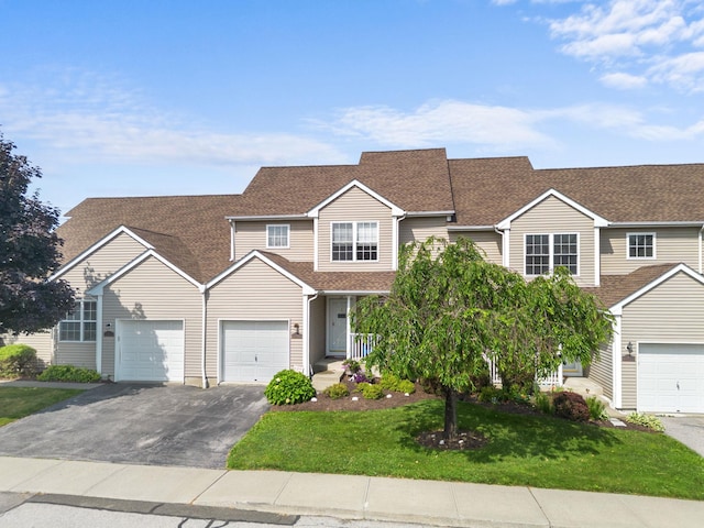 48 Sparrow Ridge Rd, Carmel, NY 10512 - view of front facade with driveway, a front yard, a garage, roof with shingles, and covered porch