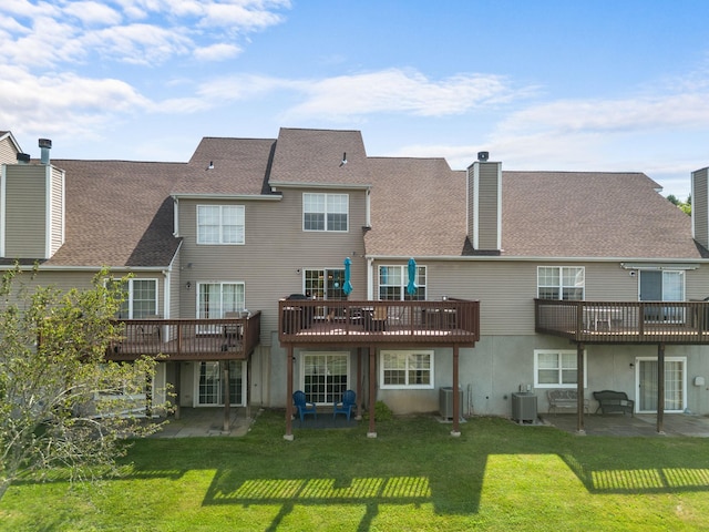 48 Sparrow Ridge Rd, Carmel, NY 10512 - rear view of property with a yard, a patio, a chimney, and a wooden deck