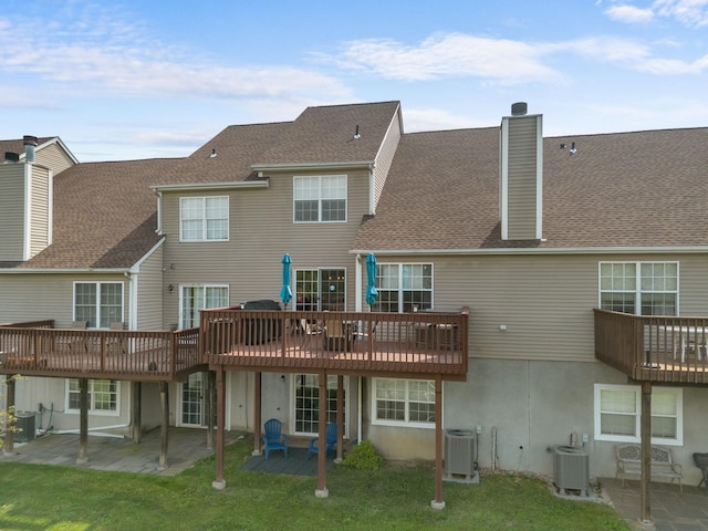 48 Sparrow Ridge Rd, Carmel, NY 10512 - rear view of house with a chimney, a patio, a yard, and a wooden deck