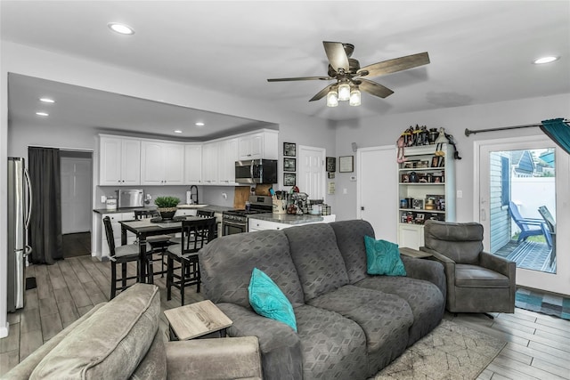 18 Seawane Rd, East Rockaway, NY 11518 - living area featuring ceiling fan, light wood finished floors, and recessed lighting