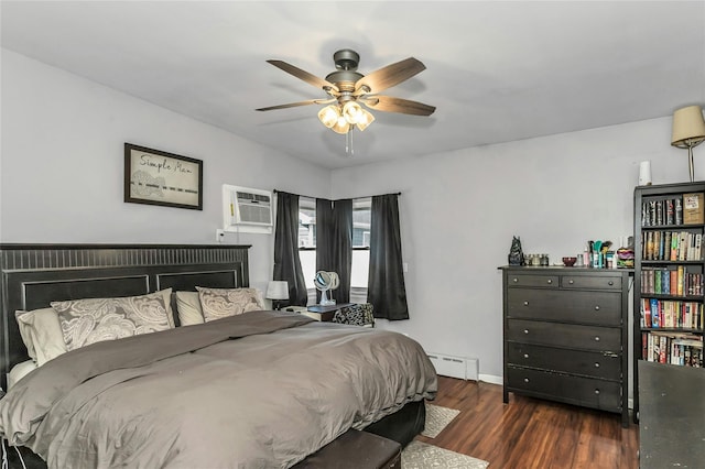 18 Seawane Rd, East Rockaway, NY 11518 - bedroom with a baseboard radiator, a wall mounted AC, dark wood-style flooring, and ceiling fan