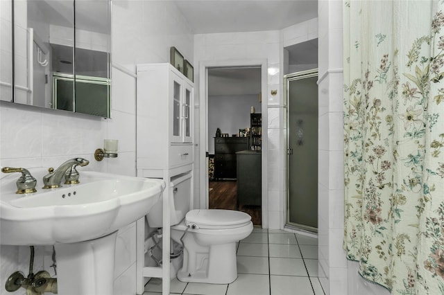 18 Seawane Rd, East Rockaway, NY 11518 - full bathroom with a shower stall and tile patterned flooring