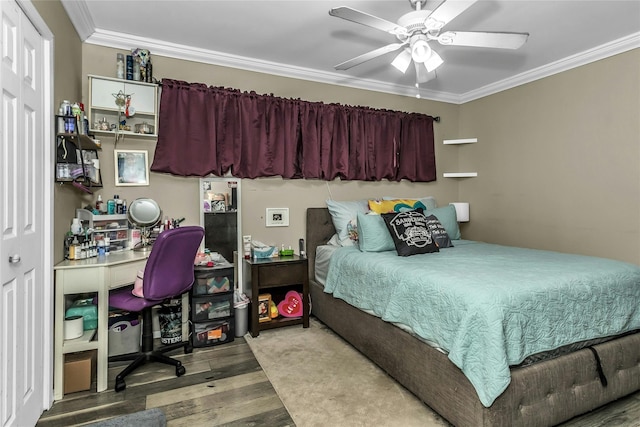 18 Seawane Rd, East Rockaway, NY 11518 - bedroom with crown molding, wood finished floors, a ceiling fan, and a desk