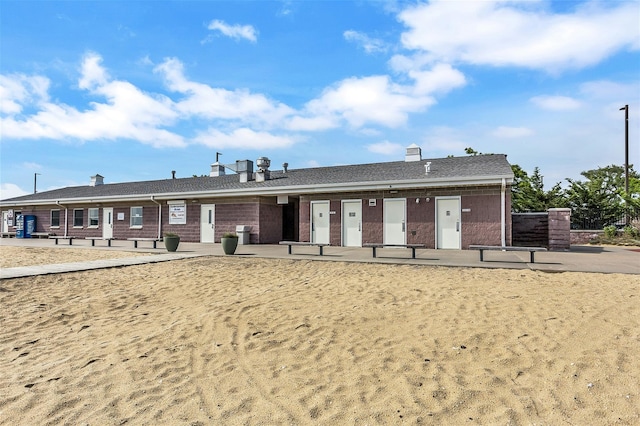 18 Seawane Rd, East Rockaway, NY 11518 - view of front facade featuring brick siding