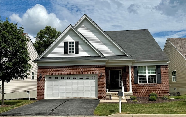 8 Jasmine Dr, Middletown, NY 10940 - traditional-style home with brick siding, asphalt driveway, a garage, and roof with shingles