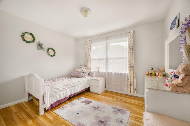 7 Frost Ln, Hartsdale, NY 10530 - bedroom featuring light wood finished floors and baseboards