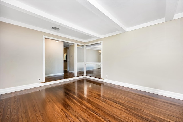 45 Mc Cue Ln, Babylon, NY 11702 - unfurnished room featuring wood finished floors and beamed ceiling