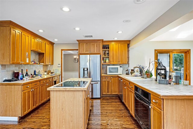 45 Mc Cue Ln, Babylon, NY 11702 - kitchen with black appliances, a peninsula, open shelves, dark wood-style flooring, and backsplash