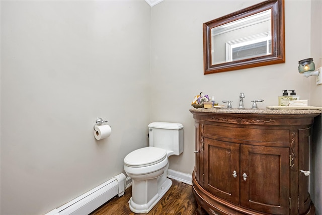 45 Mc Cue Ln, Babylon, NY 11702 - half bath featuring vanity, wood finished floors, and a baseboard radiator
