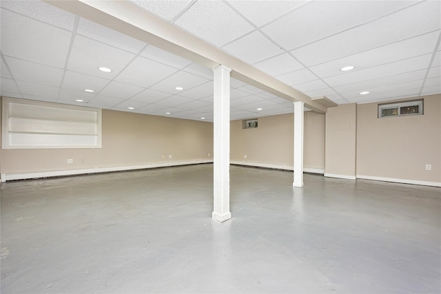 45 Mc Cue Ln, Babylon, NY 11702 - finished below grade area with a drop ceiling, recessed lighting, and baseboard heating