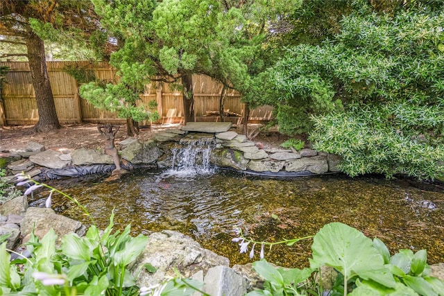 45 Mc Cue Ln, Babylon, NY 11702 - view of yard featuring a garden pond