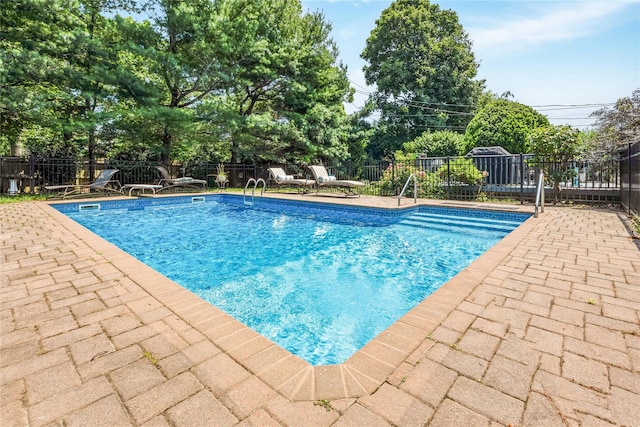 45 Mc Cue Ln, Babylon, NY 11702 - view of swimming pool featuring a patio area and a fenced backyard