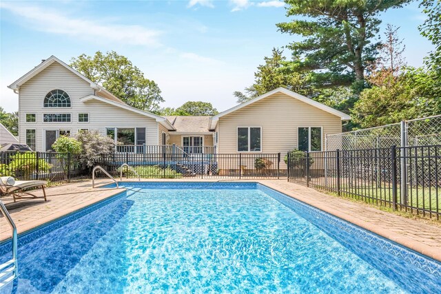 45 Mc Cue Ln, Babylon, NY 11702 - view of pool featuring a patio area