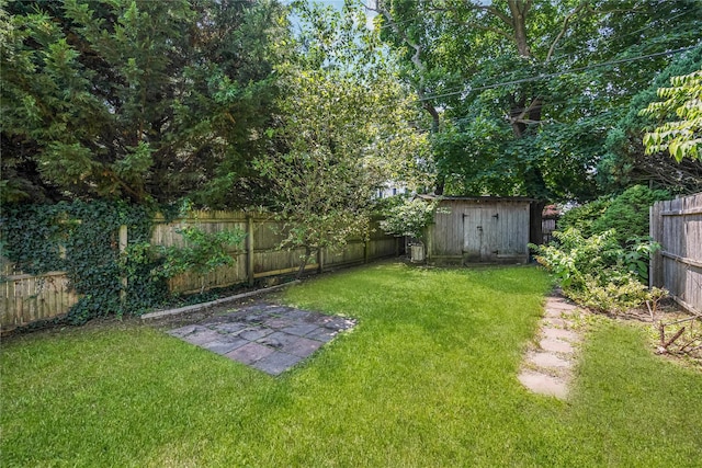 45 Mc Cue Ln, Babylon, NY 11702 - fenced backyard with a storage unit