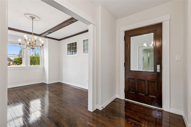 401 Ocean Ave, Malverne, NY 11565 - foyer entrance featuring a chandelier and hardwood / wood-style flooring