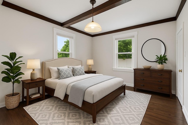 401 Ocean Ave, Malverne, NY 11565 - bedroom featuring multiple windows, dark wood-type flooring, and beamed ceiling