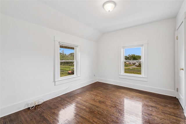 401 Ocean Ave, Malverne, NY 11565 - unfurnished room with lofted ceiling and dark wood-style floors
