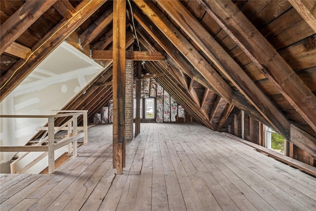 401 Ocean Ave, Malverne, NY 11565 - attic featuring an upstairs landing and healthy amount of natural light
