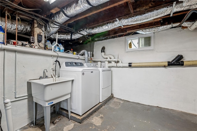 401 Ocean Ave, Malverne, NY 11565 - below grade area featuring washing machine and clothes dryer