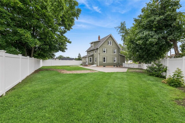 401 Ocean Ave, Malverne, NY 11565 - fenced backyard with a patio