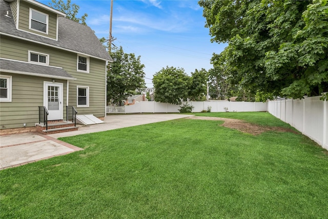 401 Ocean Ave, Malverne, NY 11565 - fenced backyard featuring entry steps and a patio