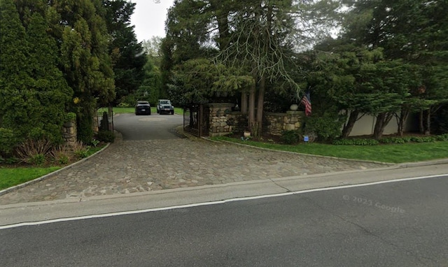 1054-1058 Plandome Rd, Manhasset, NY 11030 - view of asphalt road with curbs