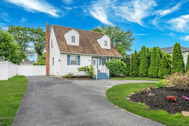 108A Union Ave, Lake Ronkonkoma, NY 11779 - cape cod house featuring curved driveway and a chimney