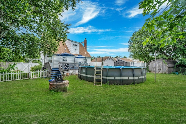 108A Union Ave, Lake Ronkonkoma, NY 11779 - fenced backyard featuring a storage shed and a wooden deck