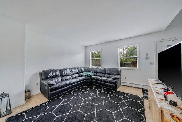 108A Union Ave, Lake Ronkonkoma, NY 11779 - living area with a baseboard heating unit and wood finished floors