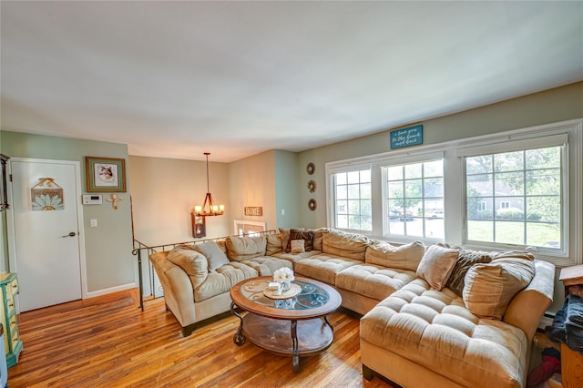 123 Lake St, Islip, NY 11751 - living area with a chandelier and hardwood / wood-style floors