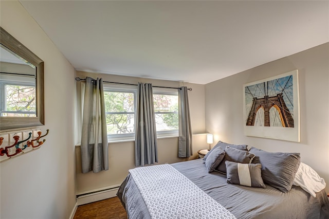 123 Lake St, Islip, NY 11751 - bedroom with a baseboard radiator and wood finished floors