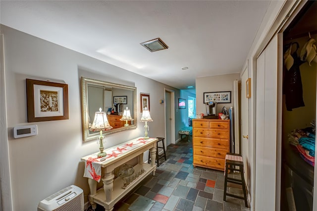 123 Lake St, Islip, NY 11751 - hallway with dark stone finish flooring
