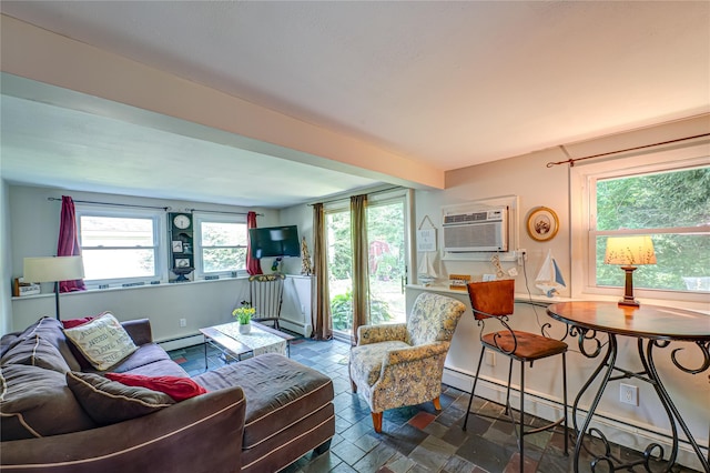 123 Lake St, Islip, NY 11751 - living area featuring baseboard heating, a wall unit AC, and dark stone finish flooring