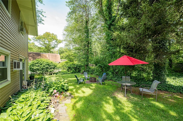 123 Lake St, Islip, NY 11751 - view of green lawn with a fire pit