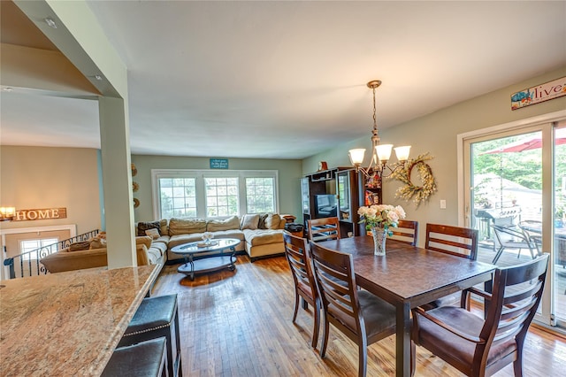 123 Lake St, Islip, NY 11751 - dining room featuring a chandelier and wood finished floors