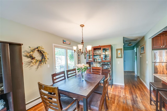 123 Lake St, Islip, NY 11751 - dining space with a chandelier and wood finished floors