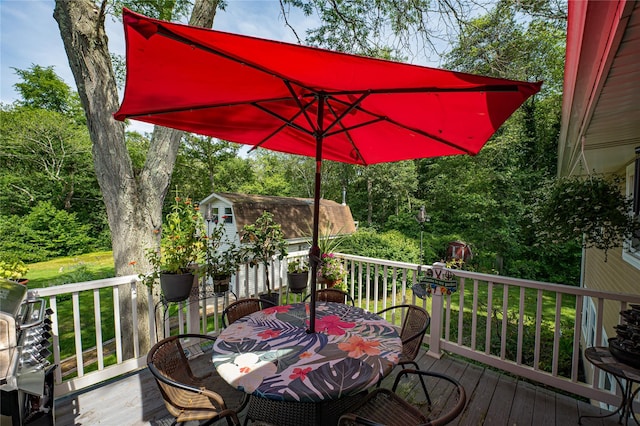 123 Lake St, Islip, NY 11751 - deck featuring outdoor dining space and a storage unit