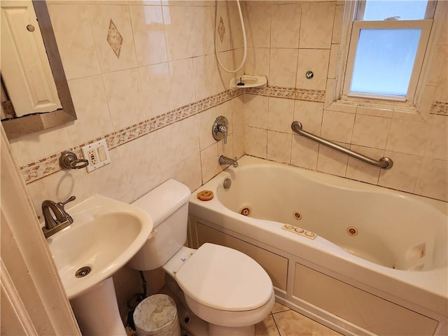 815 Swinton Ave, Bronx, NY 10465 - bathroom with tile walls and tile patterned floors