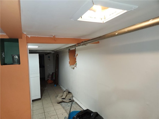 815 Swinton Ave, Bronx, NY 10465 - finished below grade area featuring light tile patterned flooring