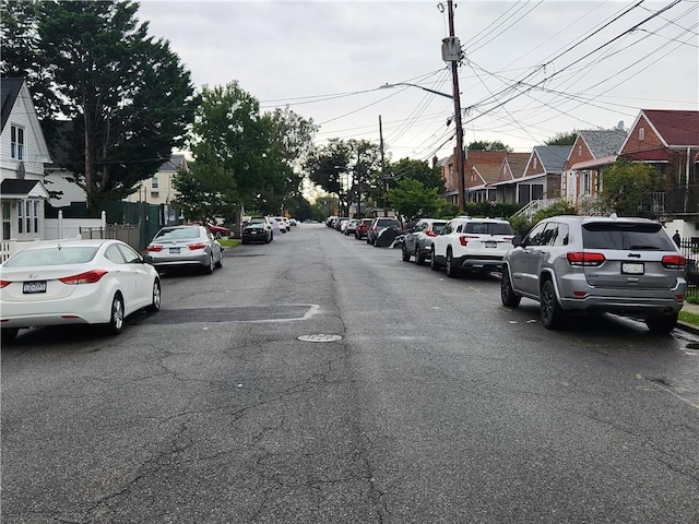 815 Swinton Ave, Bronx, NY 10465 - view of asphalt road with street lights and a residential view