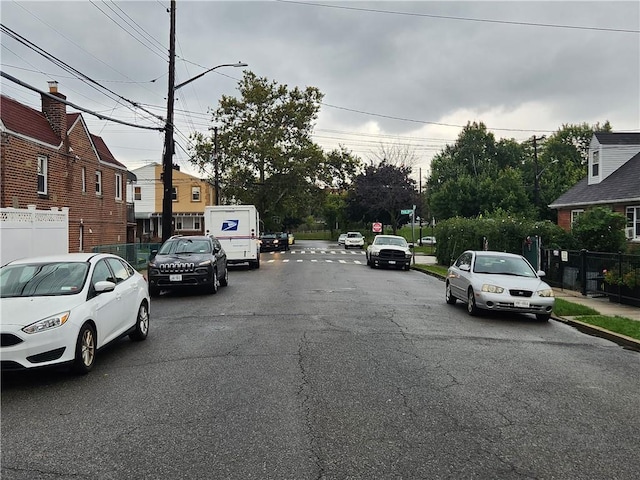815 Swinton Ave, Bronx, NY 10465 - view of asphalt street with street lights, curbs, and sidewalks