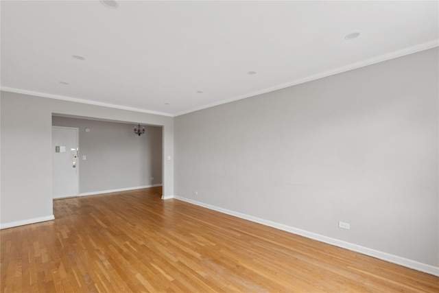 33-25 90th St Unit 3A, Jackson Heights, NY 11372 - empty room with ornamental molding and light wood-style flooring